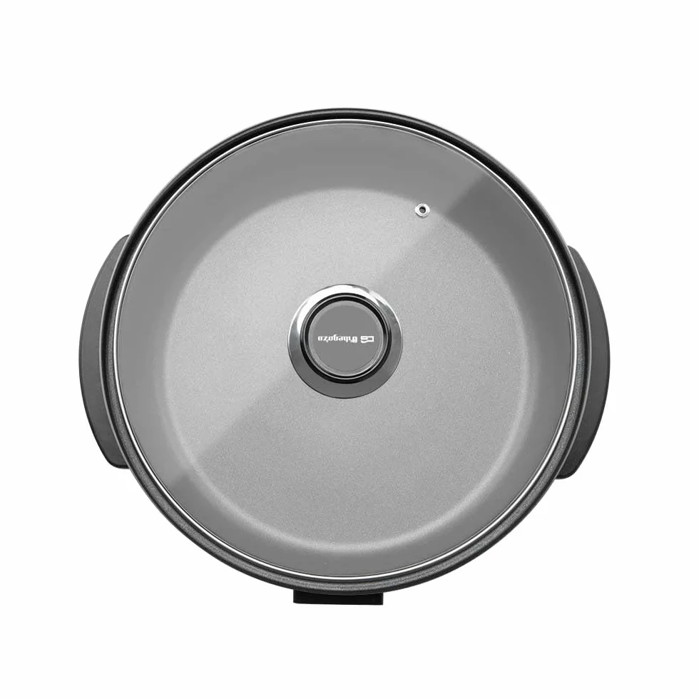 Marmite électrique Orbegozo PZ 4211, 42 cm, 1500 W, capacité 6 litres, couvercle en verre avec poignée et valve de sécurité.