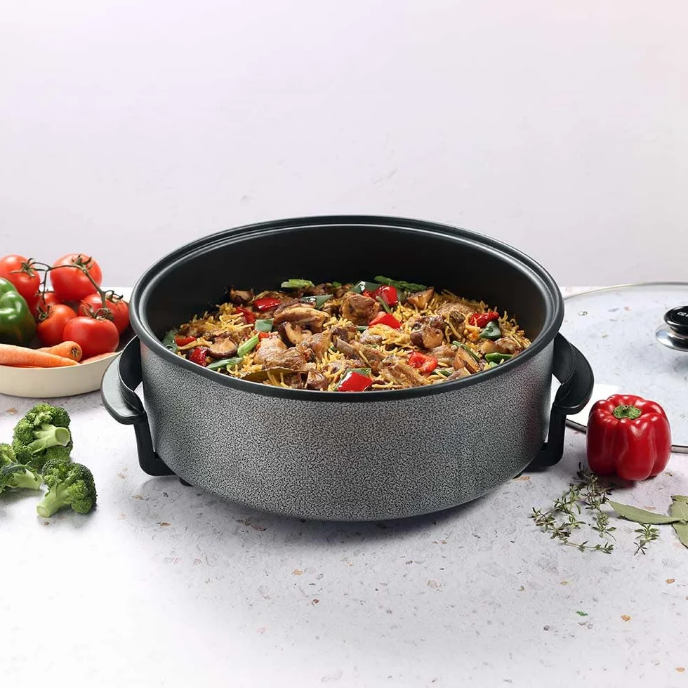 Marmite électrique Orbegozo PZ 4211, 42 cm, 1500 W, capacité 6 litres, couvercle en verre avec poignée et valve de sécurité.